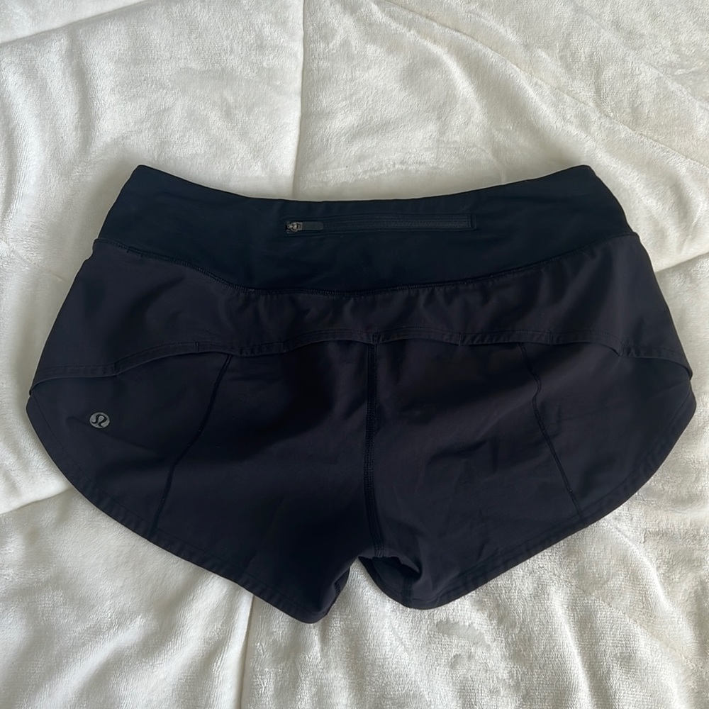 Black lululemon speed up shorts.